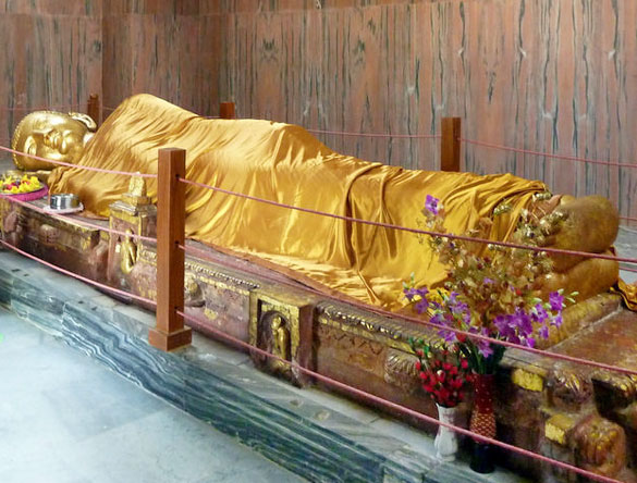 12 foot long Buddha Statue inside the Mahaparinirvana Temple, Kushinagar, India